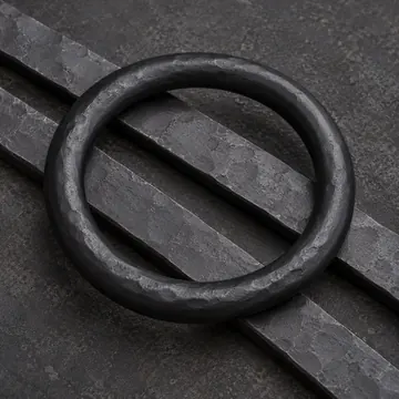 Forged matte black iron detail